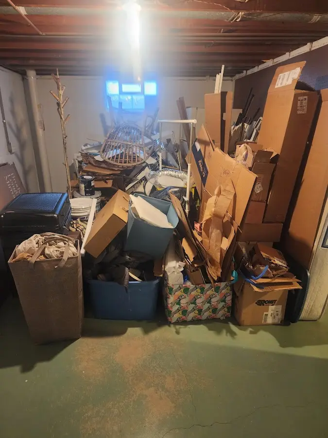 Roll-off dumpster container at job site for Concrete Dumpster Rental in Belmont